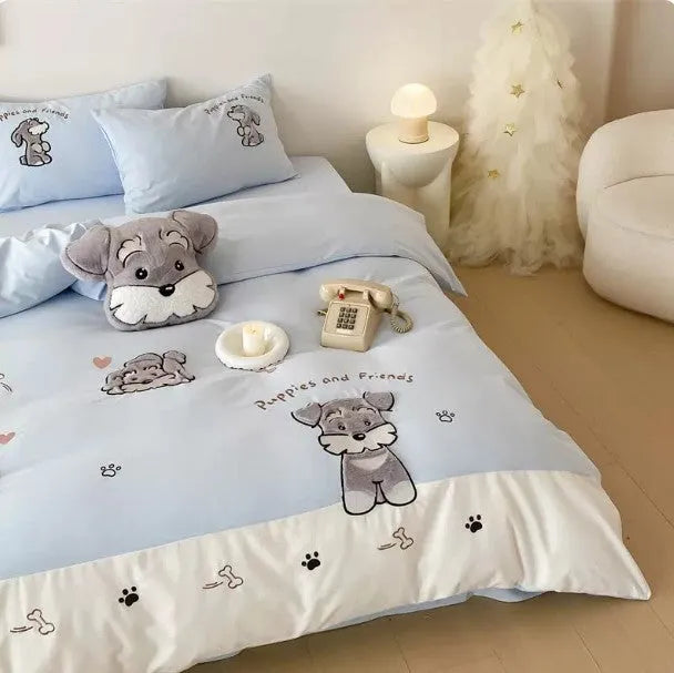 Schnauzer cartoon embroidered cotton bedding set with quilt cover, sheet, and pillowcases on bed