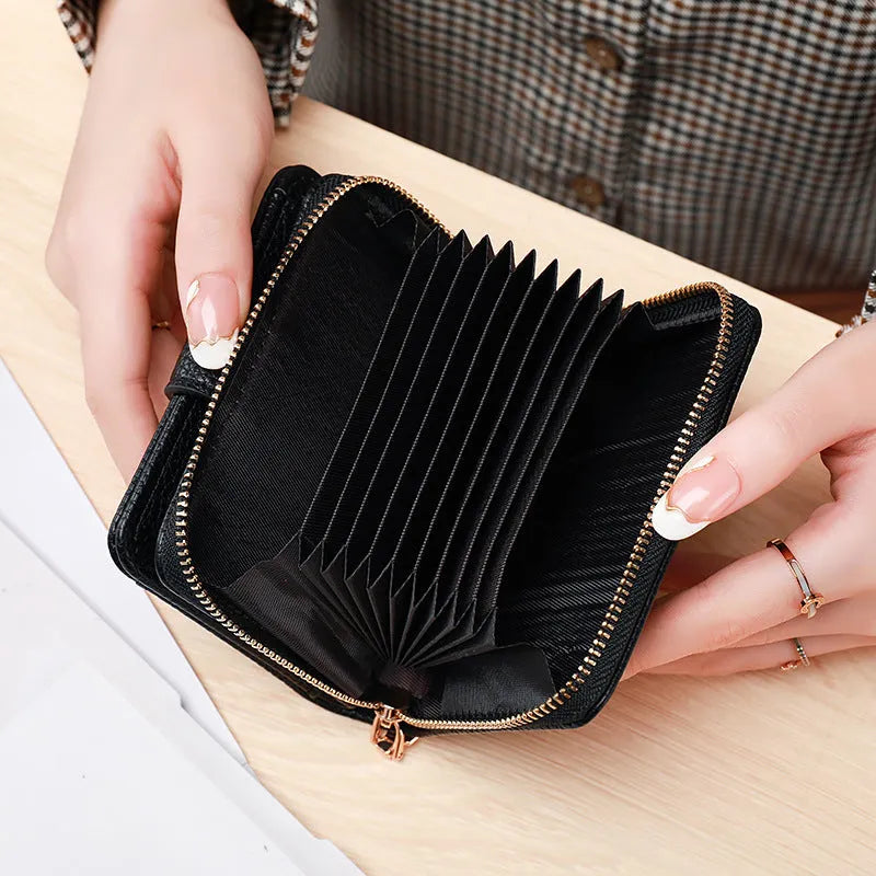 Ladies short wallet in PU leather with a lychee pattern, shown folded, in beige, pink, black, and red colour options.