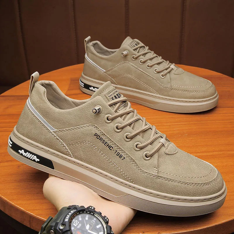Men's waterproof construction casual shoes with rubber soles in khaki, black, and grey colours