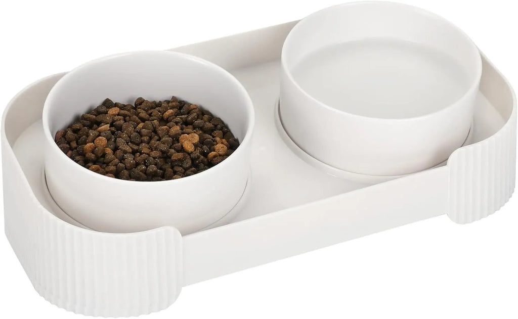 Green ceramic elevated cat bowls with 15 degree tilt on non-slip base