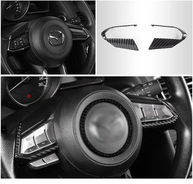 Carbon fibre decorative left and right steering wheel frame trim panels for car interior.