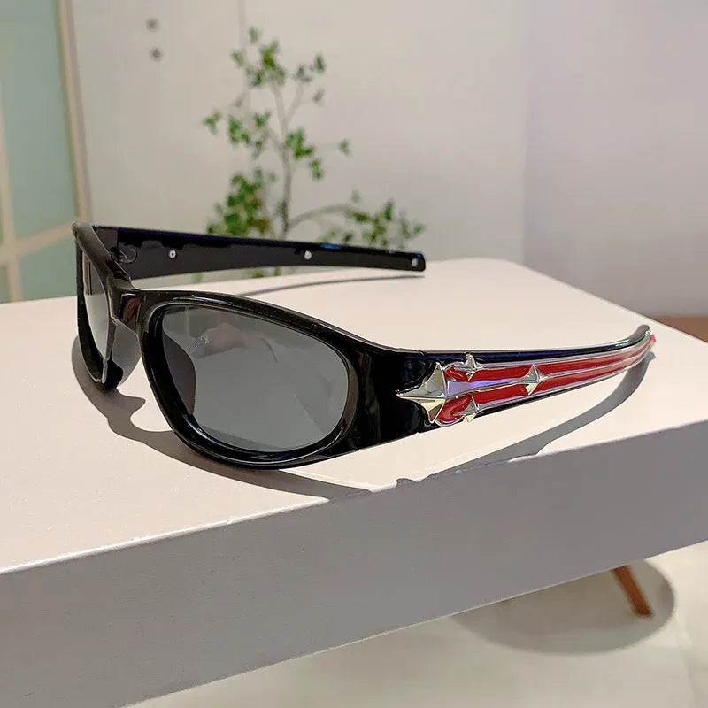 Sports sunglasses with a polycarbonate frame and lenses, shown in a choice of colours including black, red, and transparent gray.
