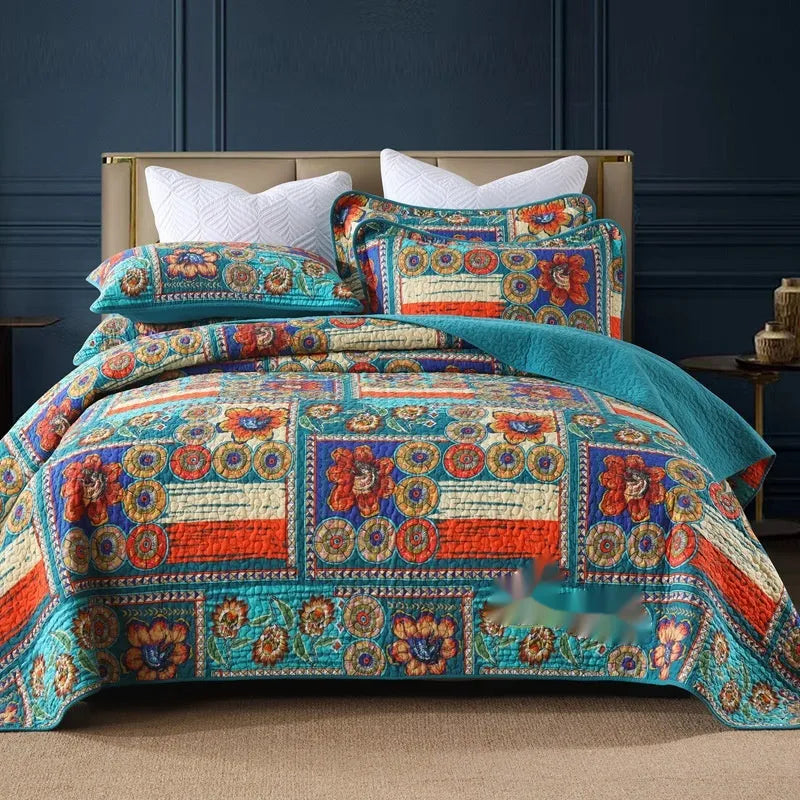 Quilted cotton bed cover set with printed pattern including bedspread and two pillowcases