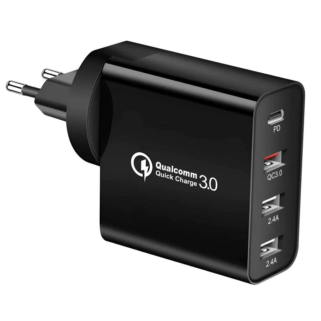 White and black multi-port USB fast wall charger with PD and QC 3.0 support on a table.