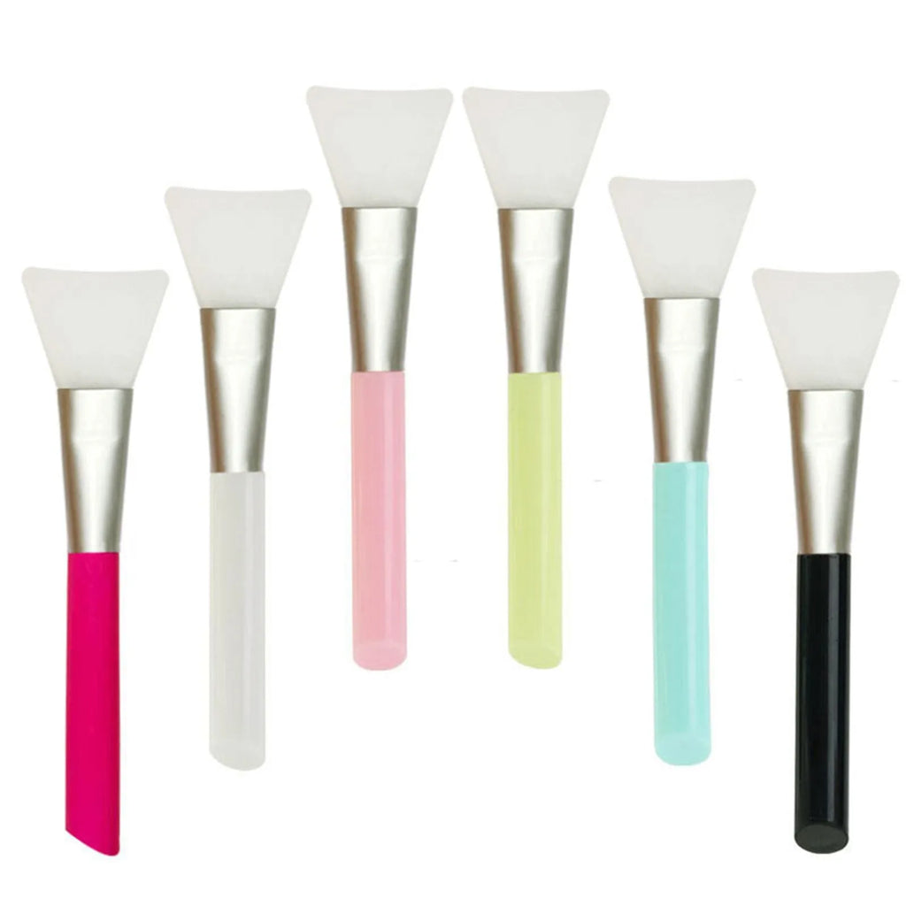Soft silicone face mask spatula applicator in a choice of six colours on a clean background.
