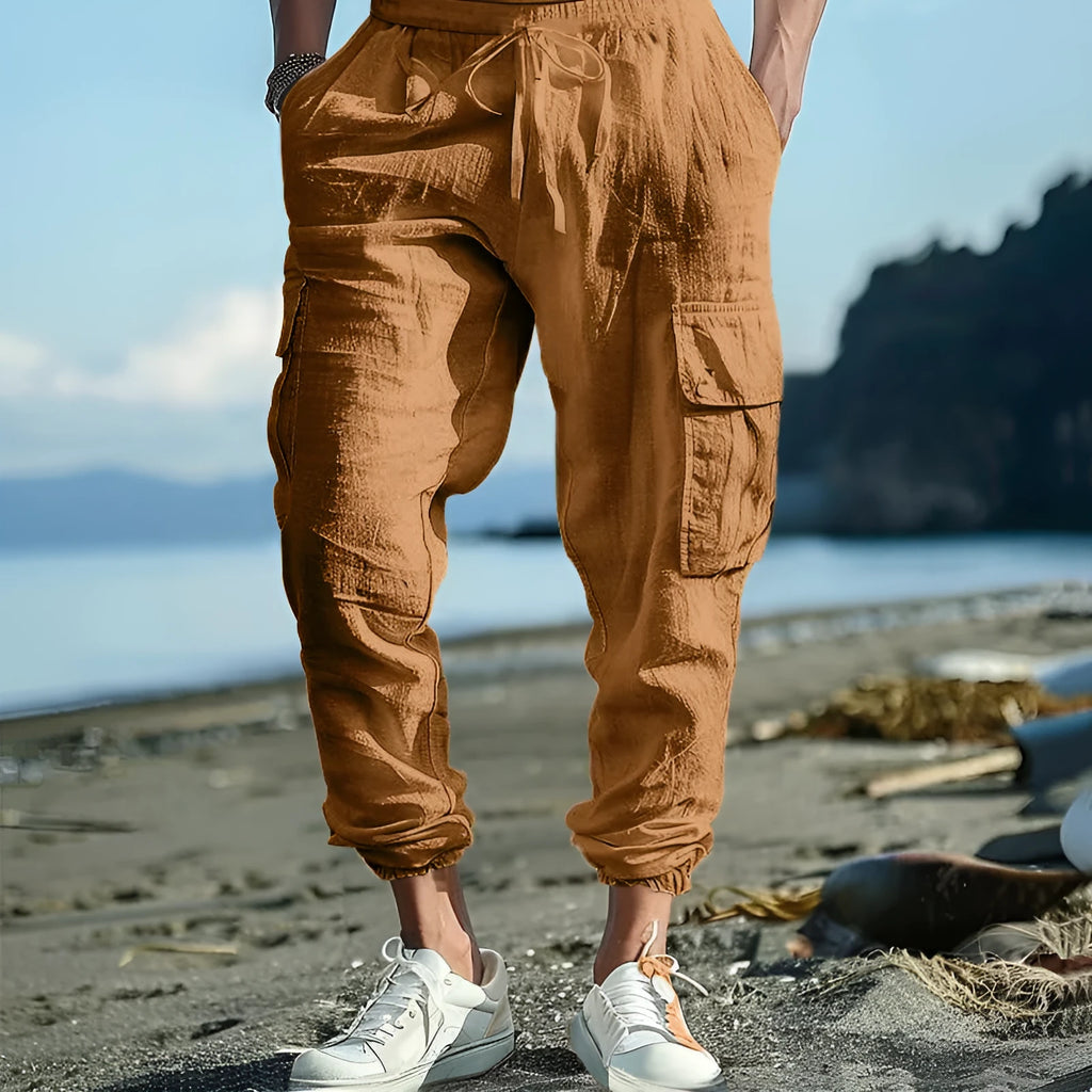 Men's linen casual trousers with ankle-tied cuffs and multiple pockets in solid colours
