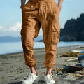 Men's linen casual trousers with ankle-tied cuffs and multiple pockets in solid colours