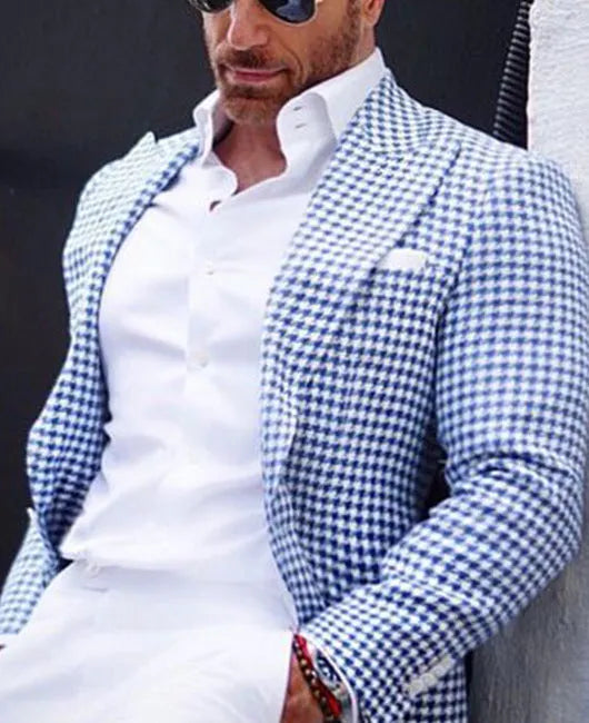 Men's slim-fit two-button suit jacket in a British style with large top-stitch pockets.