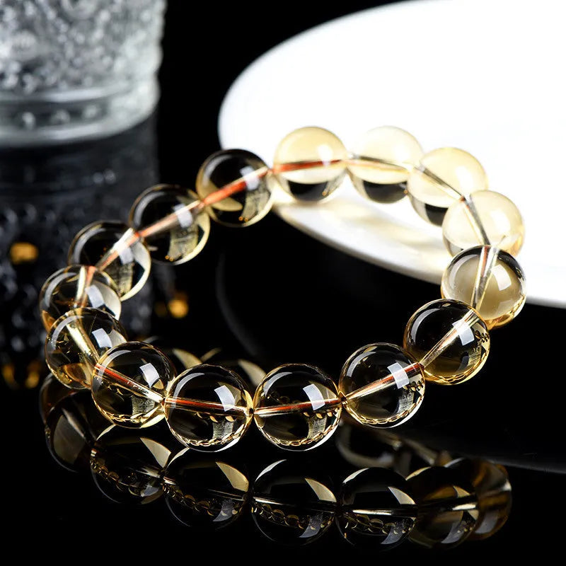 Natural citrine scattered beads ball bracelet showing polished gemstone beads in an original design.