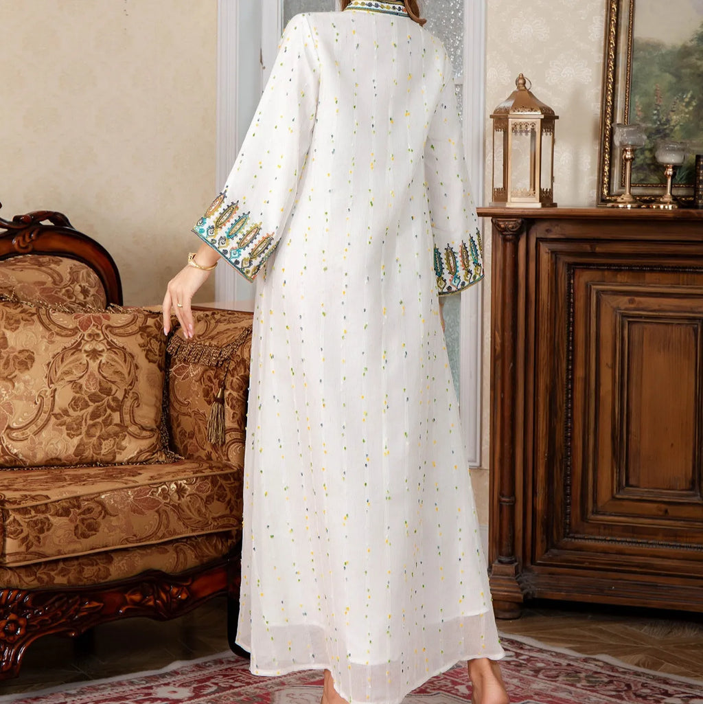 White floor-length Arabic robe with long sleeves on a hanger.