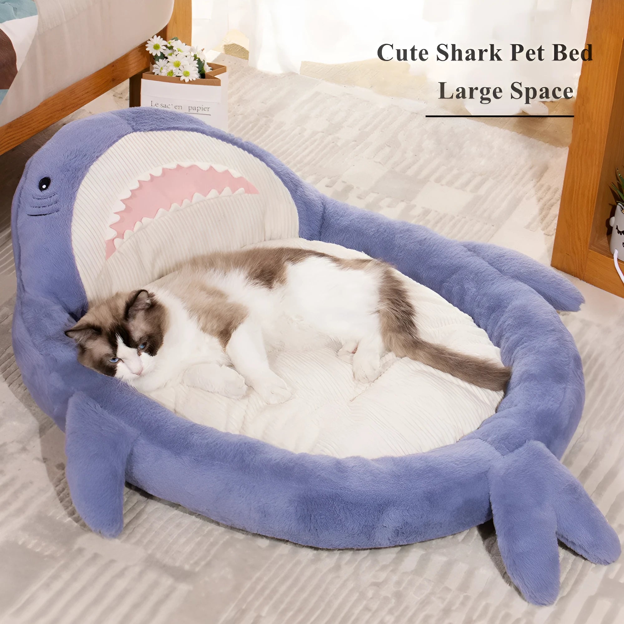 Blue shark pattern pet bed cushion for small medium dogs and cats on a floor