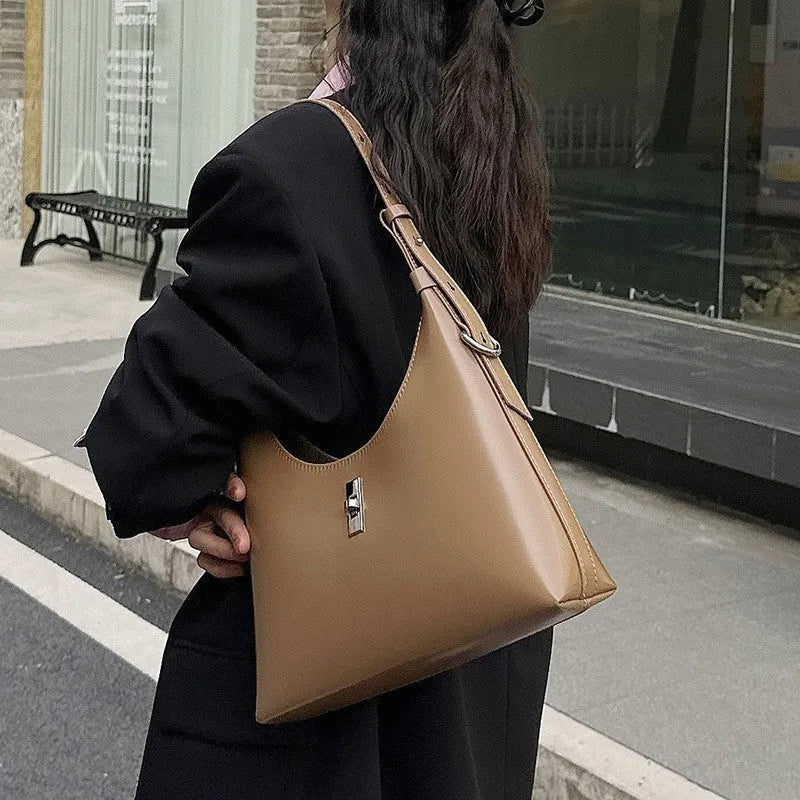 Genuine leather crossbody shoulder bag with sandwich pocket design in dumpling shape