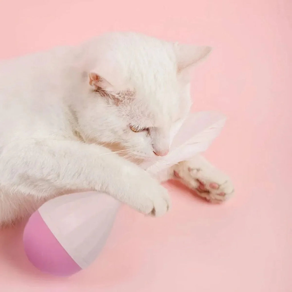 Feather tumbler cat toy with aluminium alloy construction and goose feather attachment in pink or green