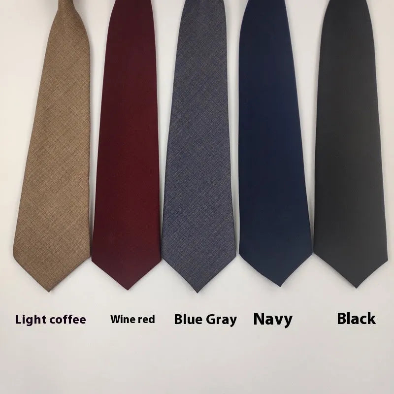 Navy blue cotton bow tie with arrow style design showing 35cm length