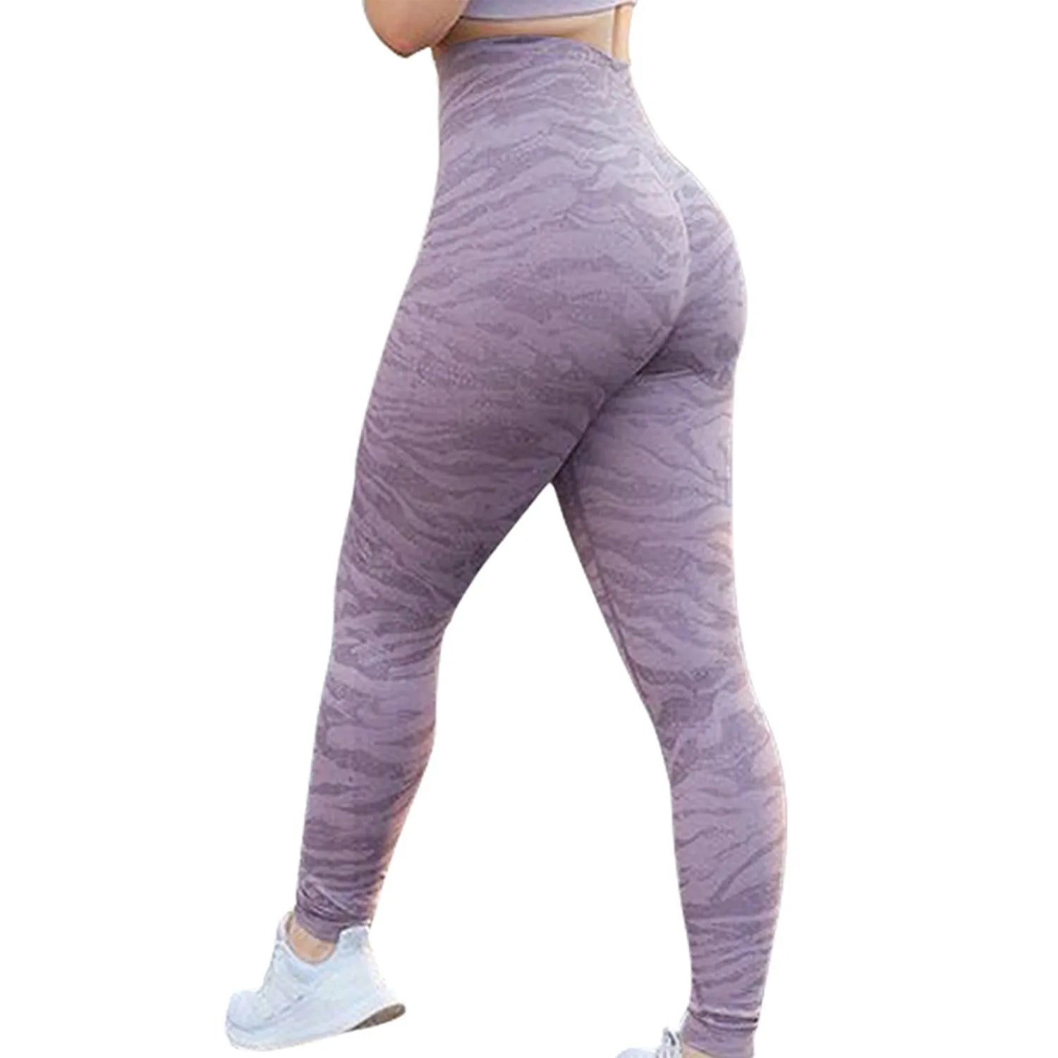 Women's butt-lifting fitness leggings in a camouflage print, shown on a model.