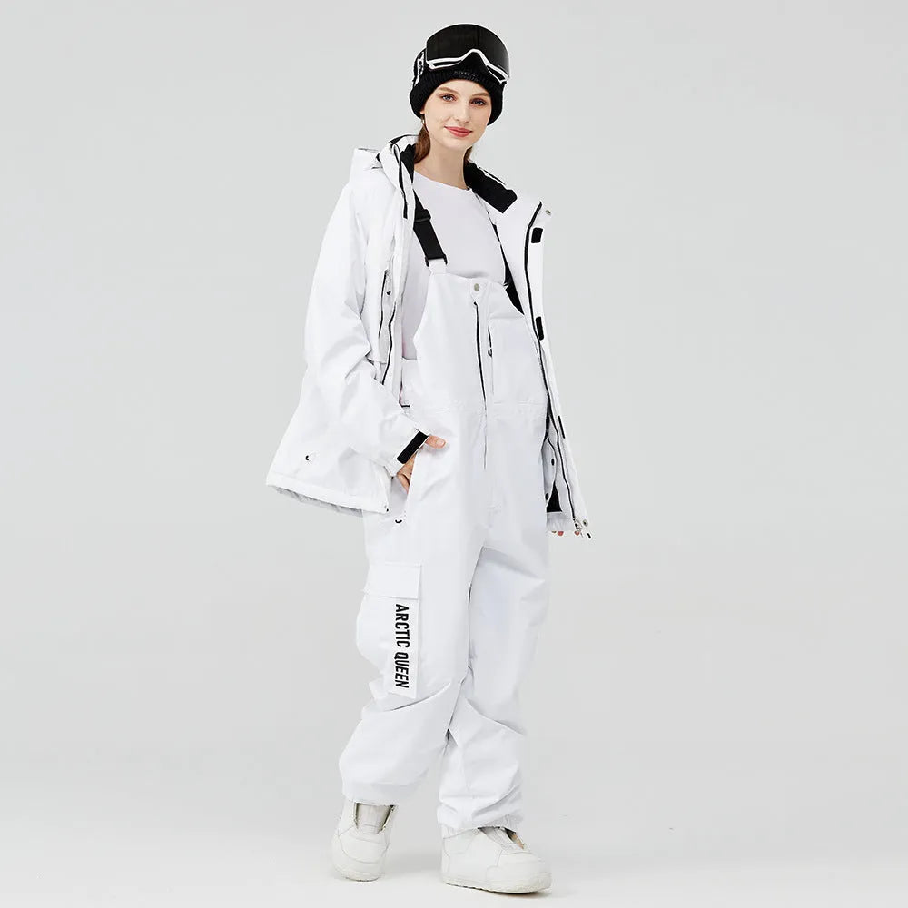 Blue and black unisex winter ski suit jacket and pants for snow sports.