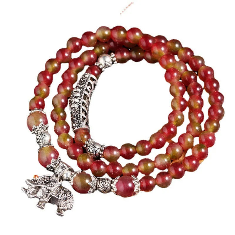 Natural watermelon crystal bracelet with Chinese knot and geometric elephant-style beads