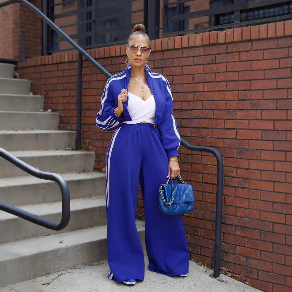 Two-piece casual suit set with zipper detailing and striped pattern in multiple colour options