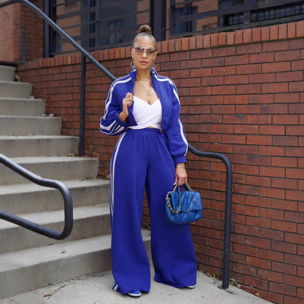 Two-piece casual suit set with zipper detailing and striped pattern in multiple colour options