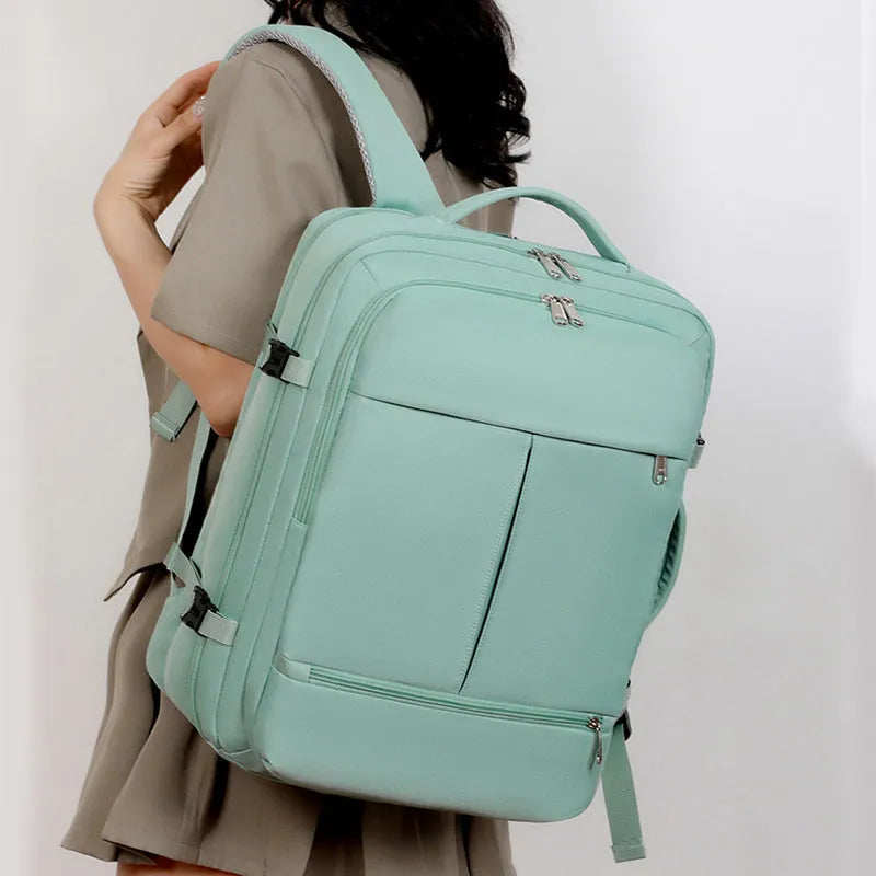 Waterproof Oxford cloth backpack in five colours showing multiple pockets and laptop compartment