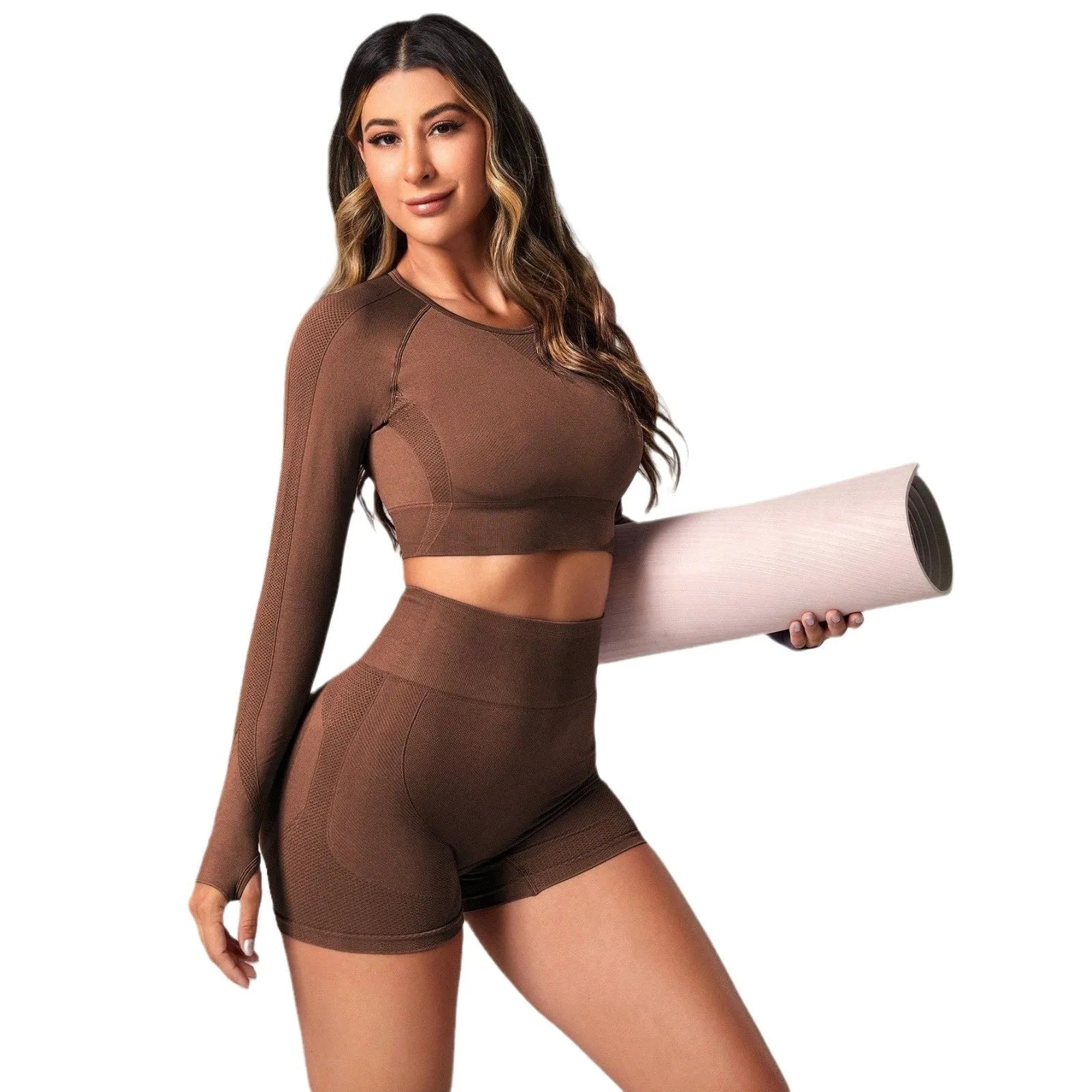 Women's black yoga suit set showing long sleeve pullover top and high-waisted tight-fitting pants.
