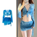 Blue high-waisted women's bikini set with matching shirt and skirt laid flat.