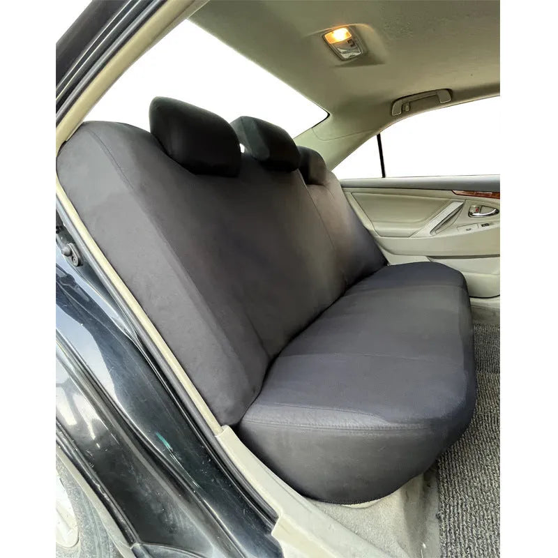 Universal polyester eyelet fabric car seat cover set in black, blue, grey or red with sponge backing.