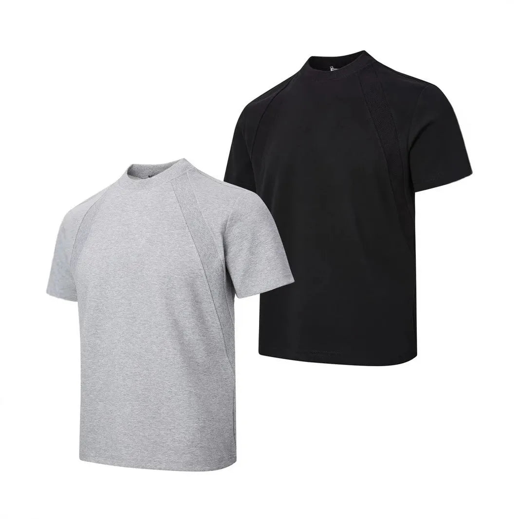 Black loose fit short sleeve top with textured air layer stitching design.
