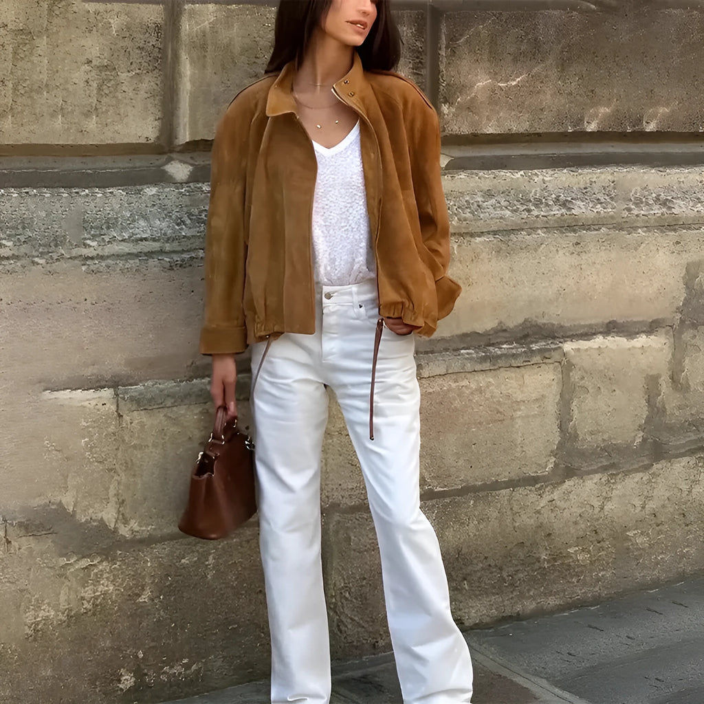 Solid colour loose-fit polyester jacket with long sleeves on a hanger