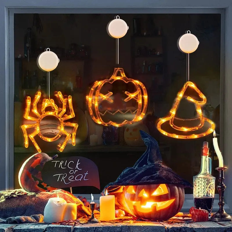 Halloween window hanging LED lights with spider pumpkin ghost designs and suction cup attachment
