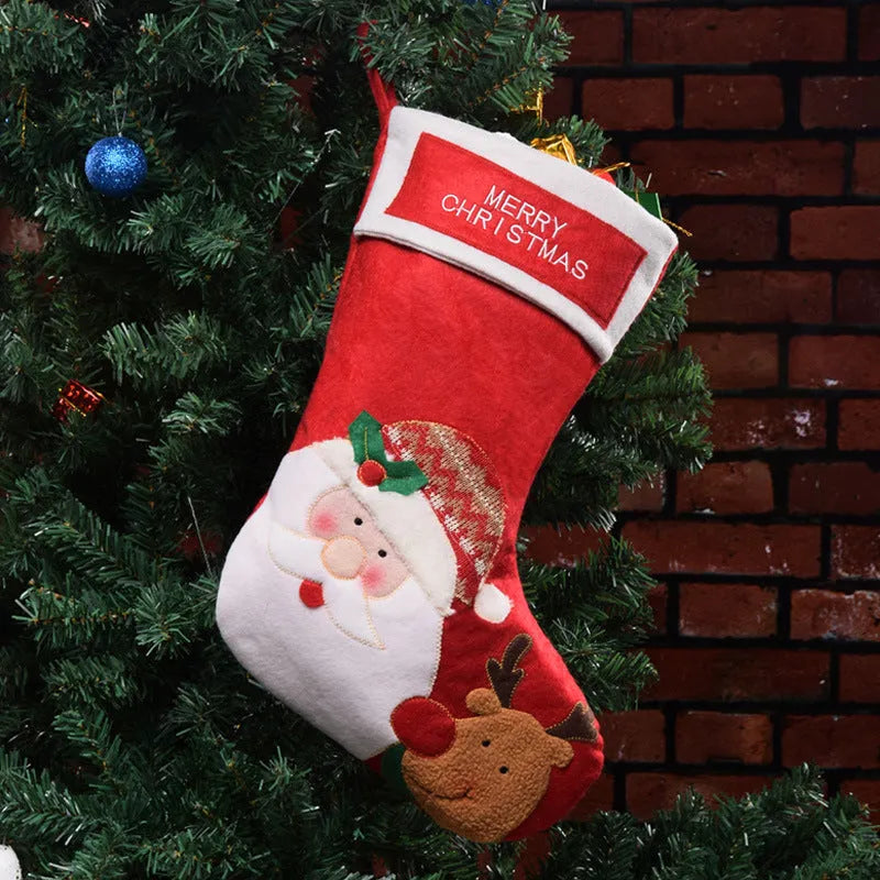 Red Christmas stocking with elk, old man and snowman printed designs in traditional American style