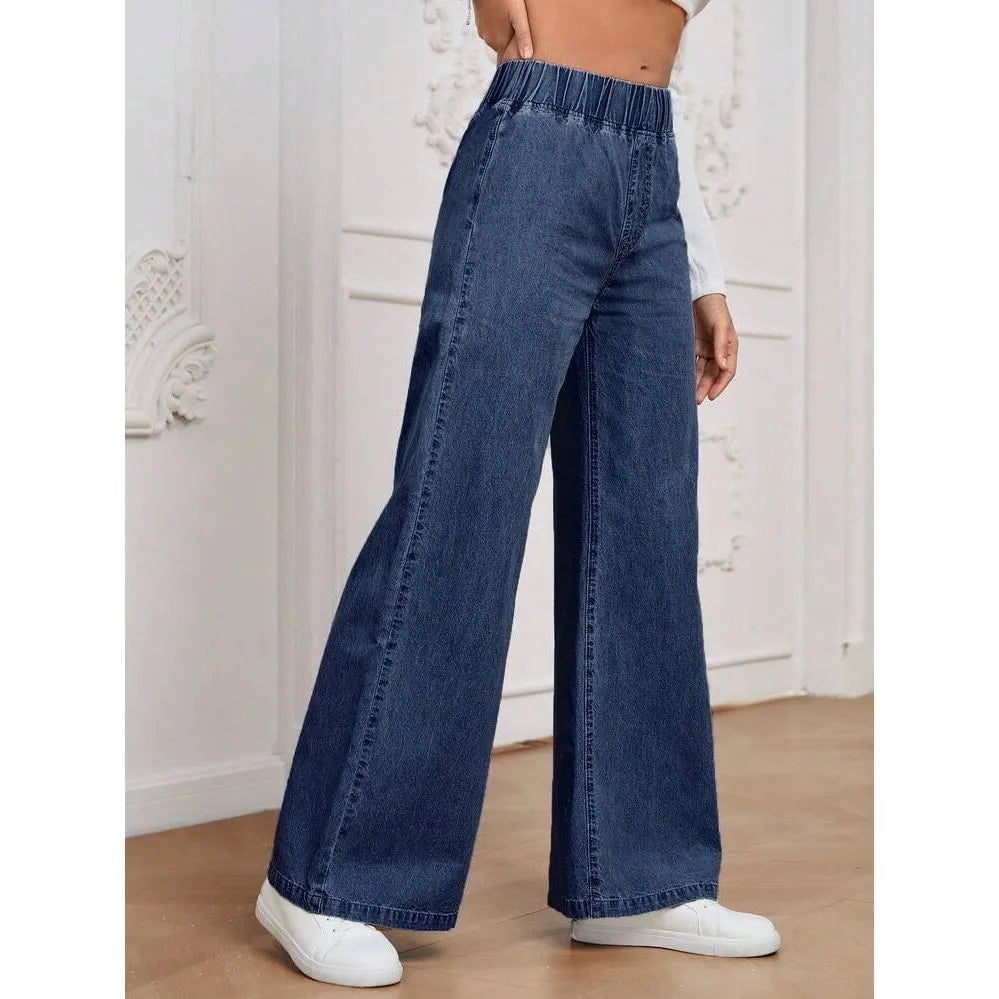 Light blue washed wide-leg denim trousers with straight cut and zip placket fly