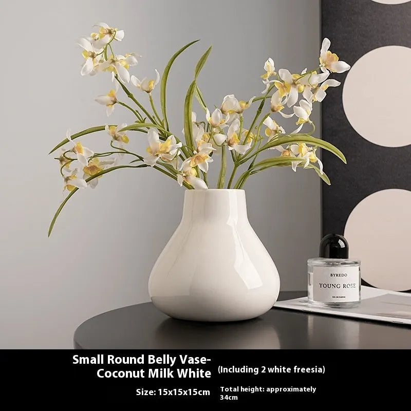 Ceramic round belly French vase with orchid flowers in black or white colour options