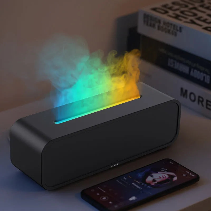 Black and white aroma diffuser with colour-changing LEDs, remote control, and USB cable.