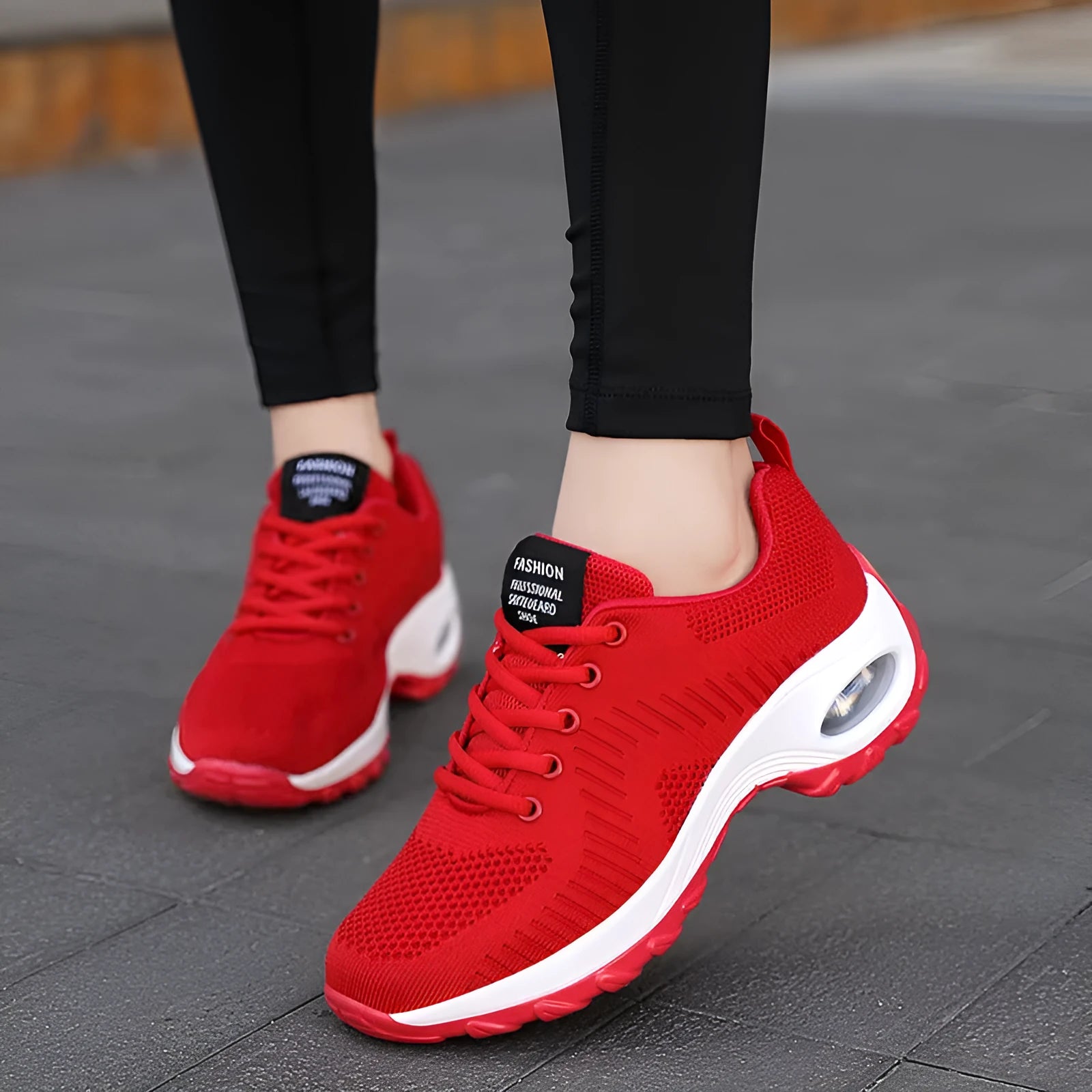 Women's black mesh sneakers with round toe and front lace-up design