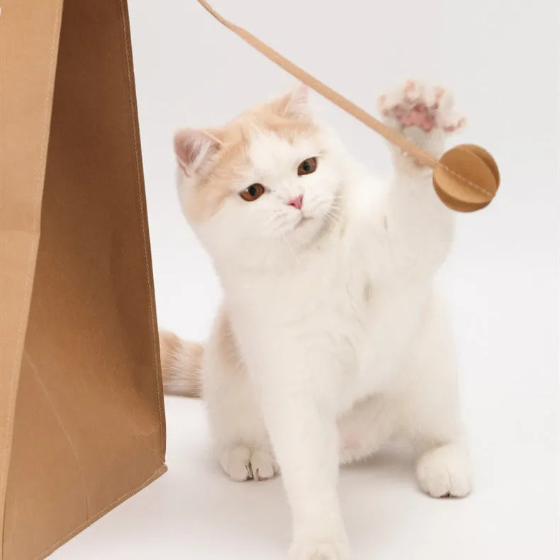 Brown integrated cat nest and scratch board unit made from washable kraft paper.