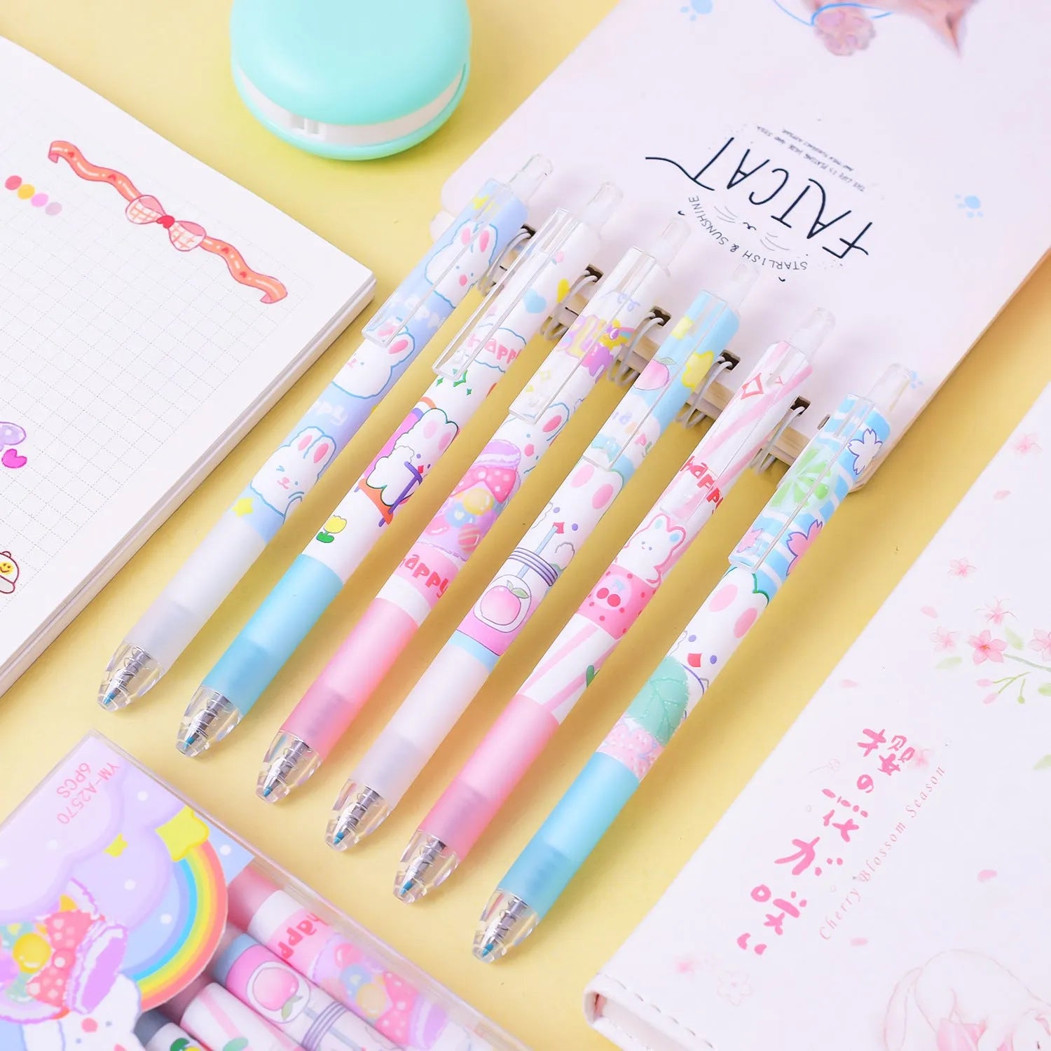 Six black pens with cartoon bunny designs and 0.5mm tips for student writing