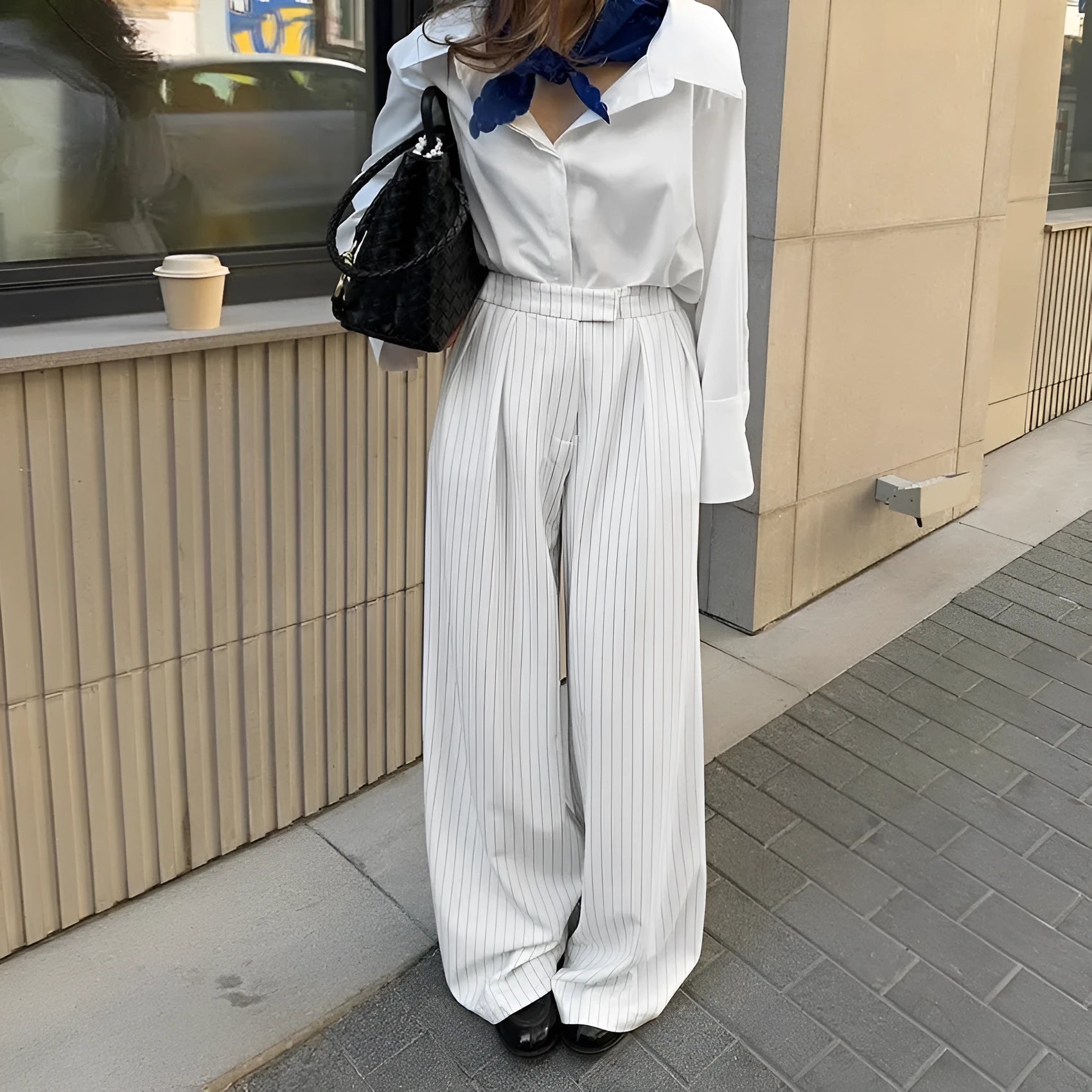 White striped wide-leg commuting trousers with zip closure on Asian-sized mannequin