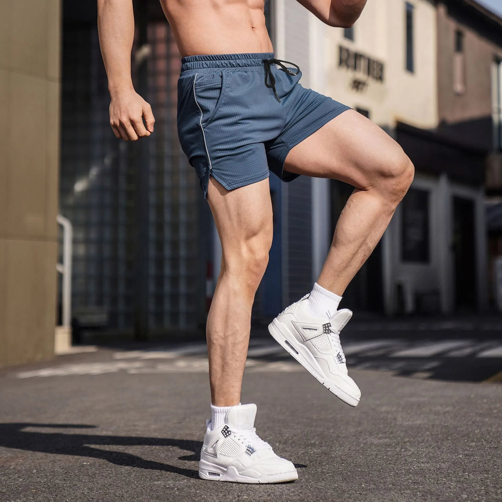 Men's straight-leg polyester sports shorts in black, available in sizes M to 3XL for fitness.