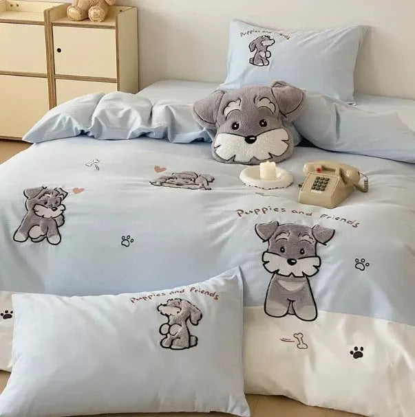 Schnauzer cartoon embroidered cotton bedding set with quilt cover, sheet, and pillowcases on bed