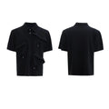 Men's black loose fit polo shirt with geometric pattern and a shirt collar.