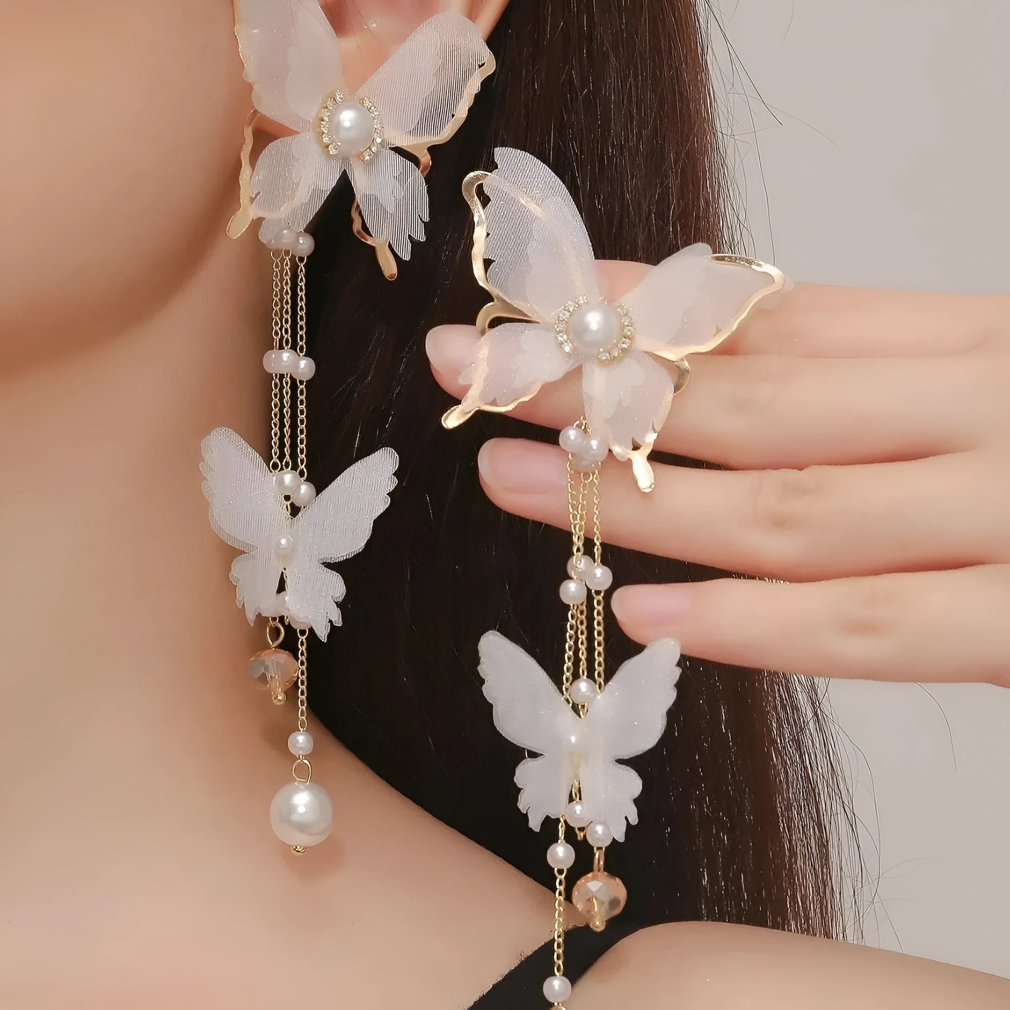 White butterfly drop earrings with tassel lace, pearls and rhinestones on copper alloy