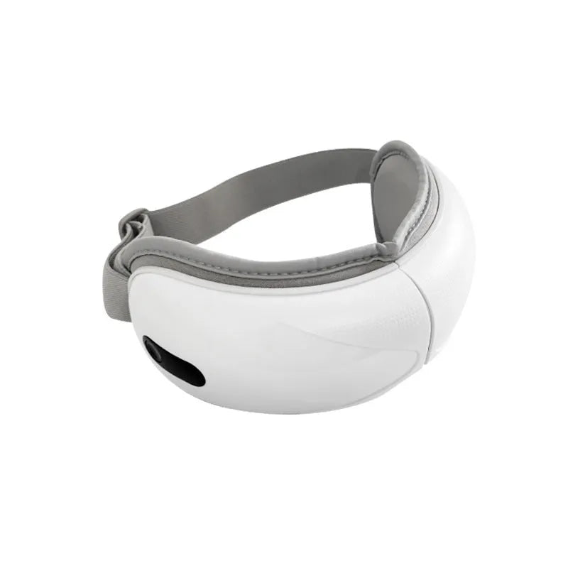 White rechargeable eye massager with airbag compression and heat therapy functions for relieving eye fatigue