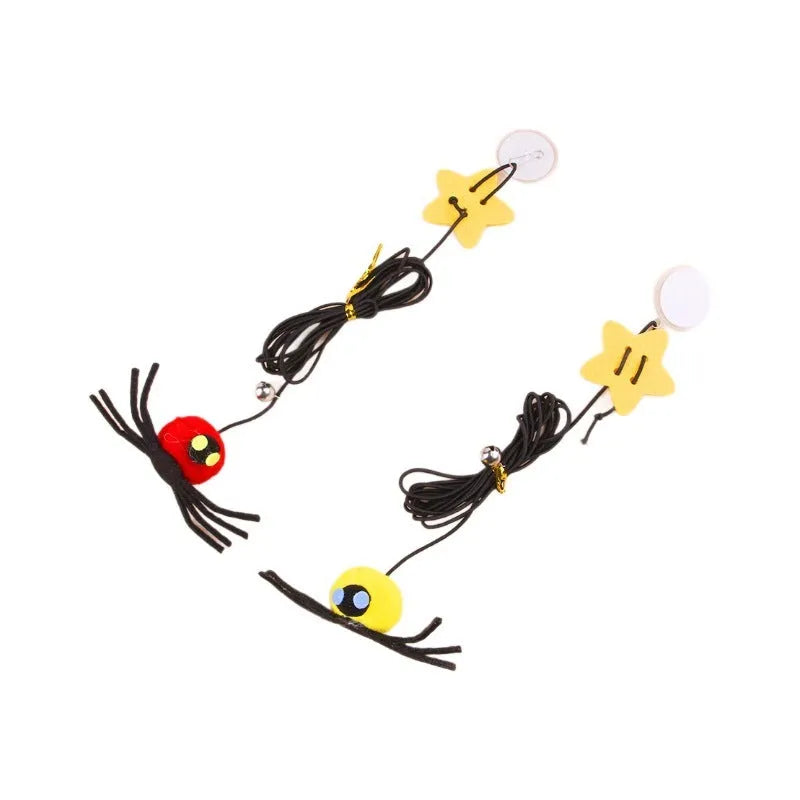 Red cat door hanging toy with swinging elastic rope, feather attachment, and bell spider