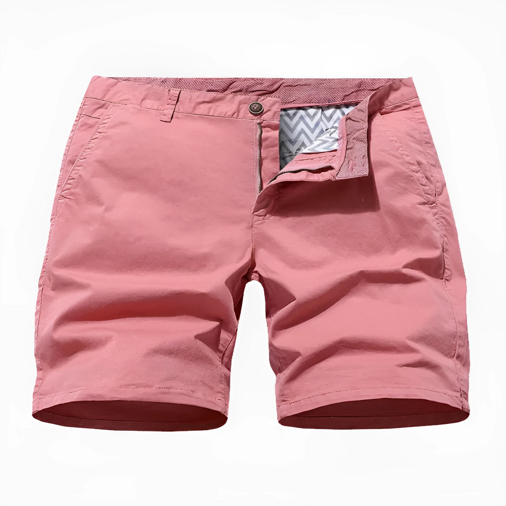 Men's loose fit denim shorts with elastic waist in a printed blue design, laid flat.