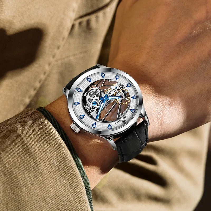 Men's silver case mechanical watch with white surface, blue hands, and black genuine leather strap