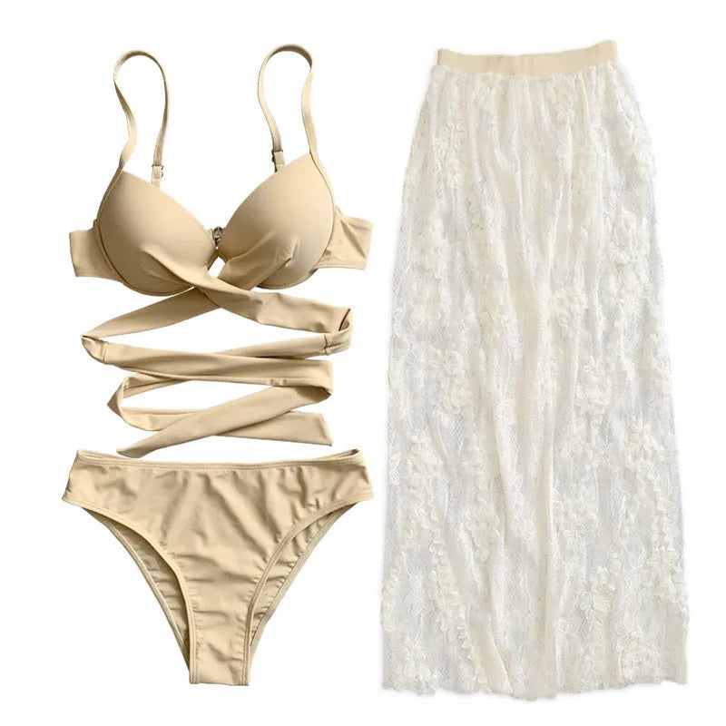 Women's three-piece bikini set with backless push-up top and skirt in solid colour