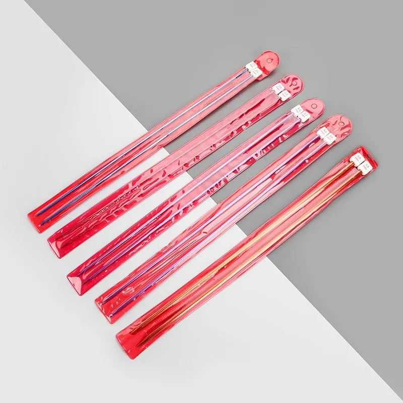 Set of crochet hooks in various sizes from 2.0mm to 9.0mm, each with a protective end cap.