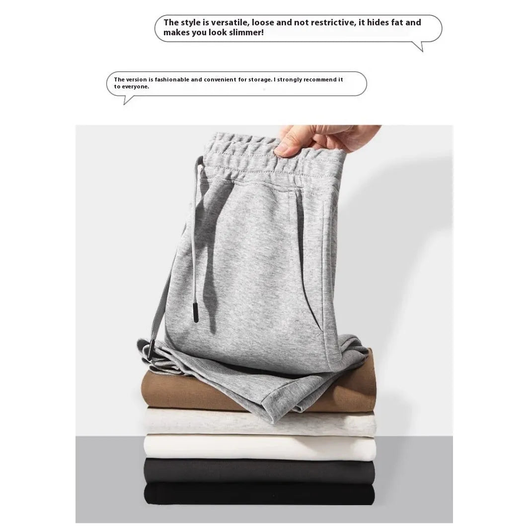 Cotton straight-leg sports shorts in light grey colour showing micro-elastic fabric and fifth pants length