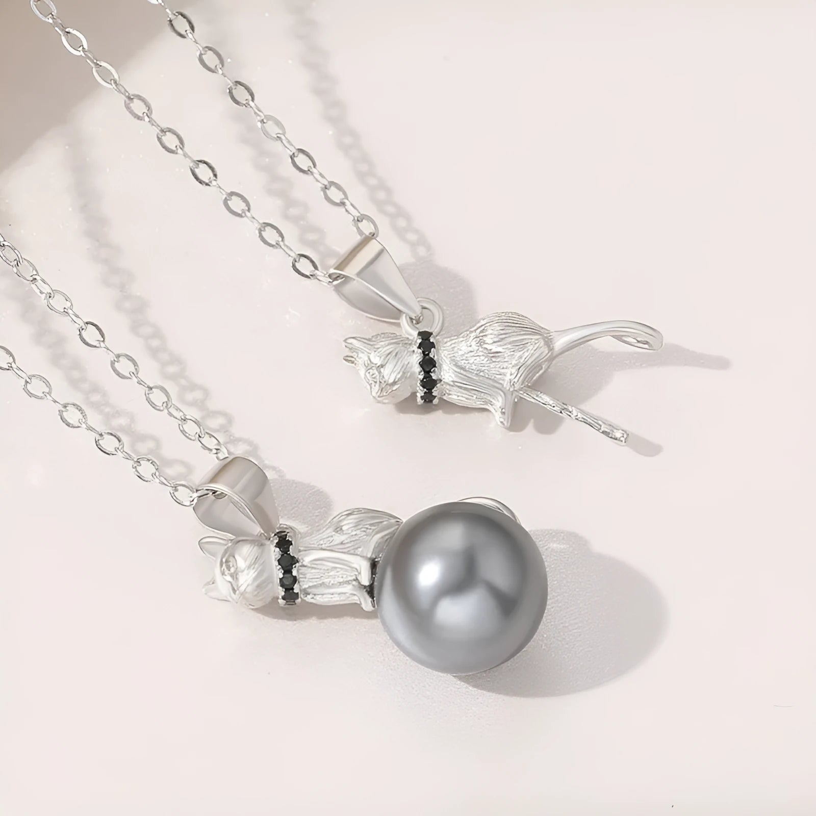 925 sterling silver cat pendant necklace with electroplated finish shown in pendant and necklace formats